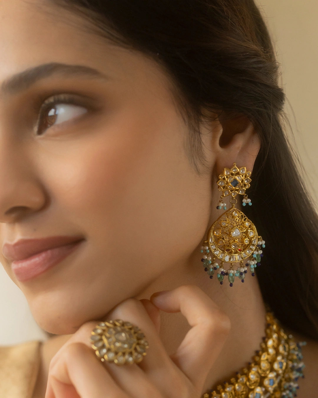 Apara gold polki earrings with emeralds cultured pearls and feroza laria