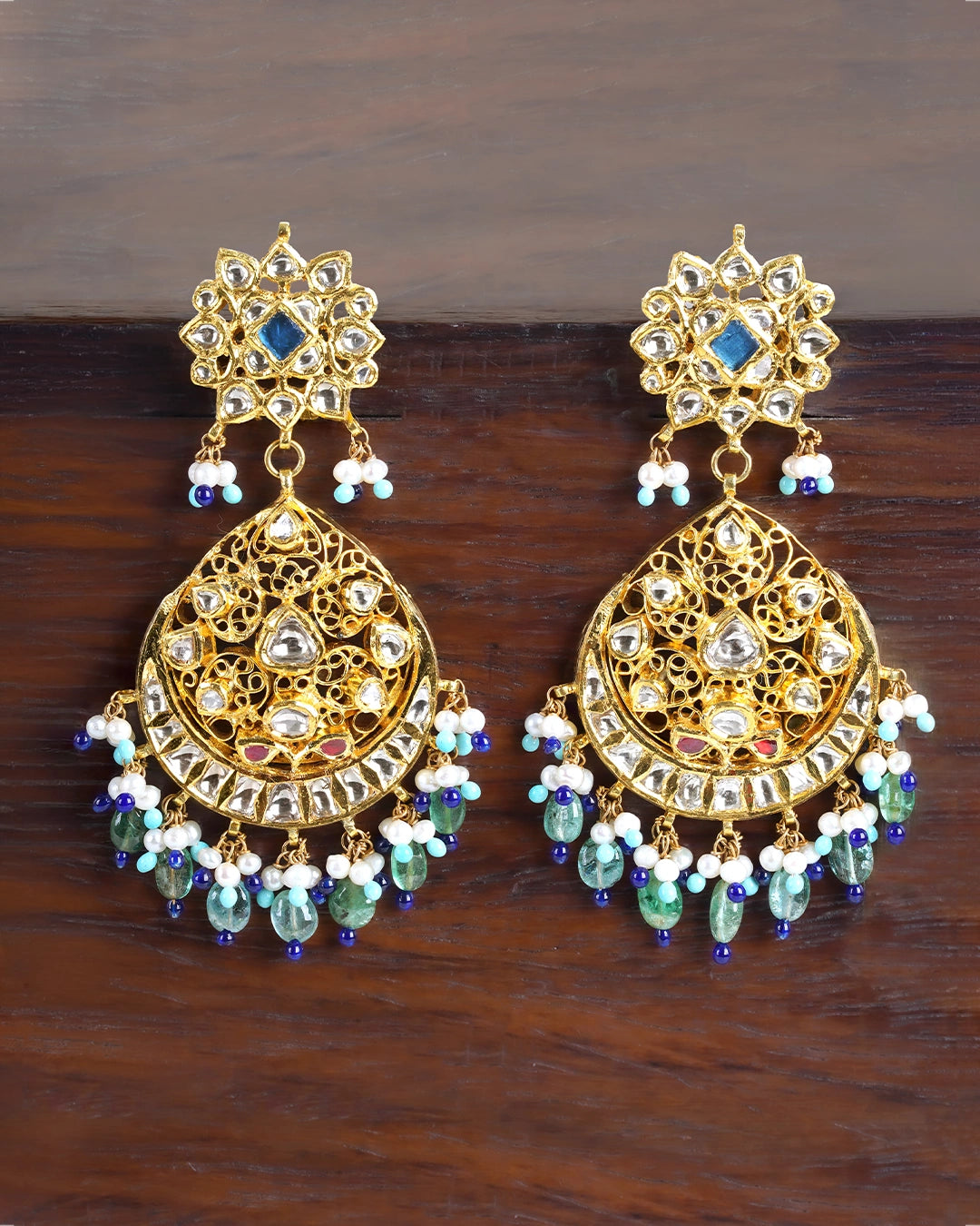 Apara gold polki earrings with emeralds cultured pearls and feroza laria