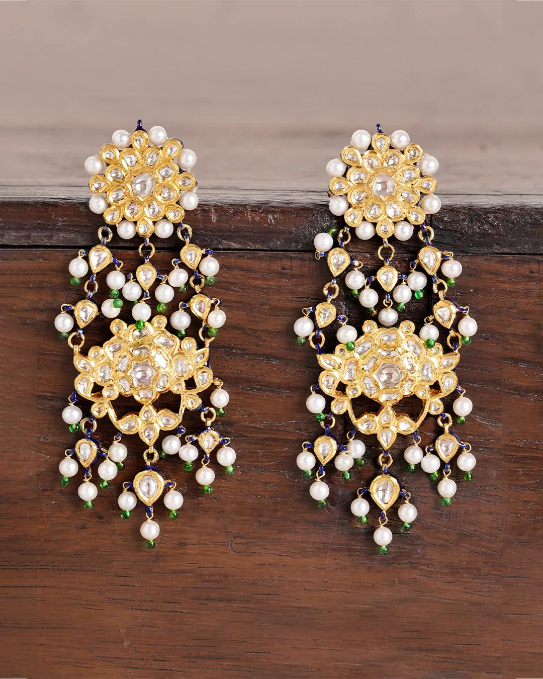 Gaurvi Polki Uncut Diamond Earrings in Gold with Green Accents