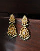 Indus handcrafted gold earrings featuring Polki diamonds, tourmalines, traditional kundan jadai, red meena chudiwork, seed pearls, and green enamel bead fringes.