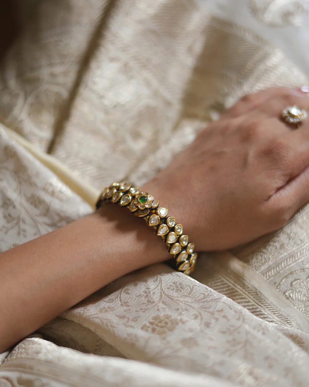Jui kundan polki bracelet with emerald and blue enamel