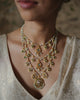 Keerat teenlada gold necklace with emeralds pearls and gemstone details