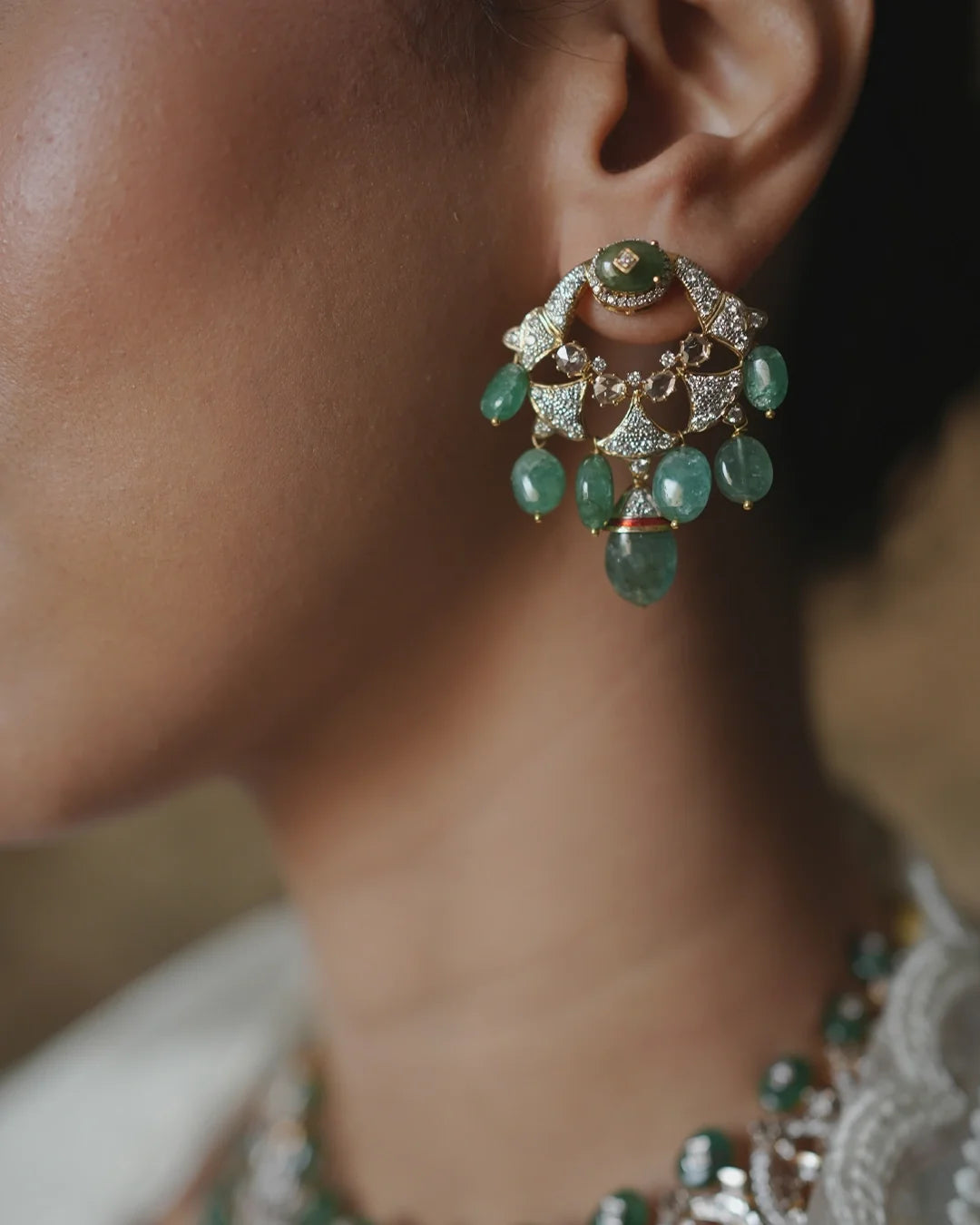 Khwabeeda chandbaali earrings with emeralds rose cut diamonds and red enamel