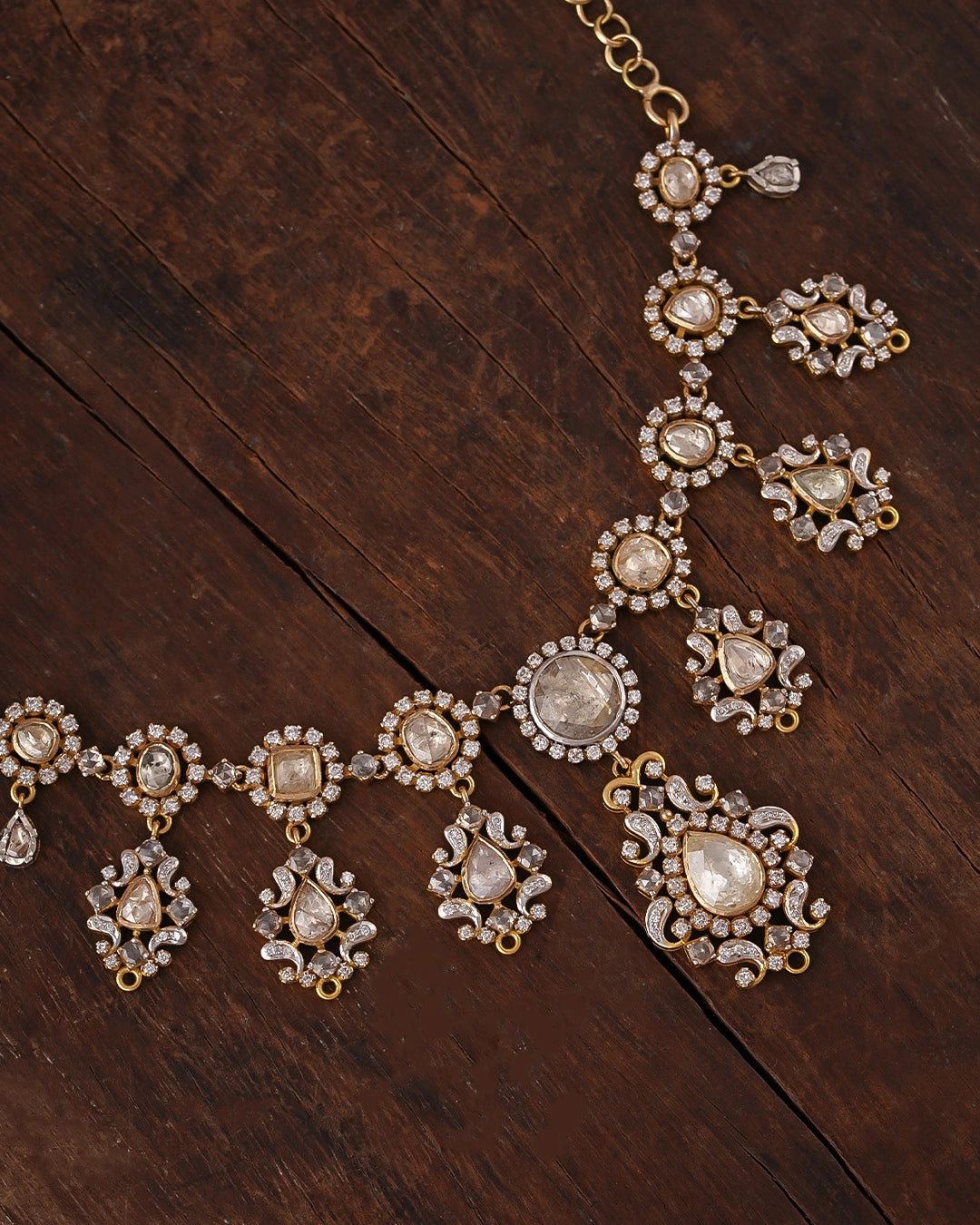 Naaz Necklace in 18k gold featuring natural rose-cut diamonds set in pendant-inspired drops, surrounded by brilliant-cut diamond halos and intricate diamond-set motifs.