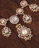 Close-up of the Naaz Necklace showing the natural rose-cut diamond centres, brilliant-cut diamond halos, and intricate gold-set motifs.
