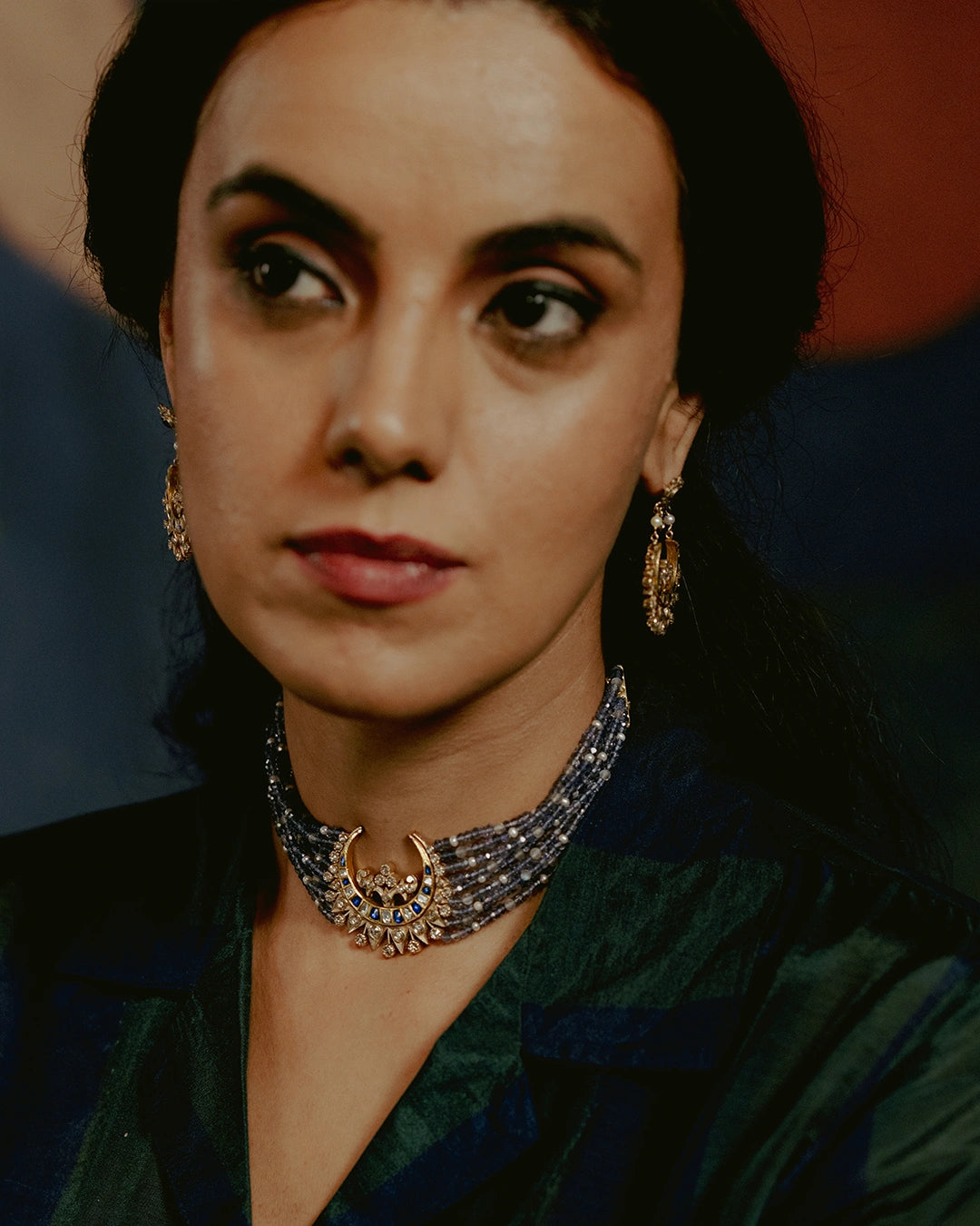 Gold Nayla Choker with iolite, pearls, labradorite beads, a crescent motif, sapphire, polki, and rose-cut diamond clusters.