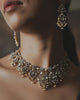 Model wearing the Saanjh diamond and pearl necklace with rose cut diamonds