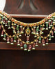 Gold Kaivi Necklace with kundan-set uncut diamonds, rubies, emeralds, pearls, green enamel accents, and cascading seed pearls and tourmaline beads for women.